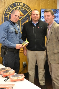 Officer Daniel Ricciardella with Dr. John Kulin, CEO of Urgent Care Now (Right) and James Jones, Marketing Director of Urgent Care Now (Middle).